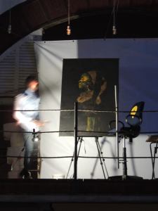 but more than the live painting happening on the balcony...